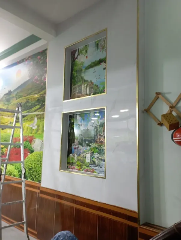 Công trình tranh PVC vân đá tráng gương thực tế do Xưởng Tân Thành thi công Công trình tranh PVC vân đá tráng gương thực tế do Xưởng Tân Thành thi công
