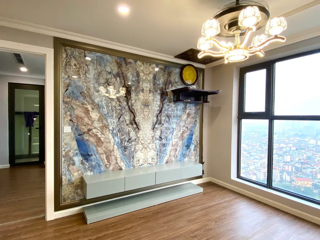 Tranh đá cẩm thạch marble vân xanh trắng ốp tường kệ tivi phòng khách